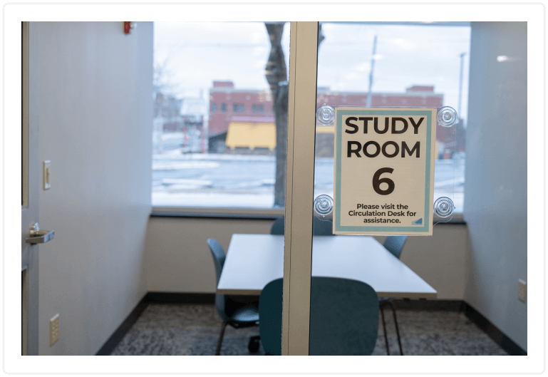 Study room through a glass window in Anderson Public Library