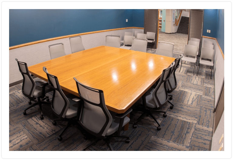 Meeting room with square desk and chairs